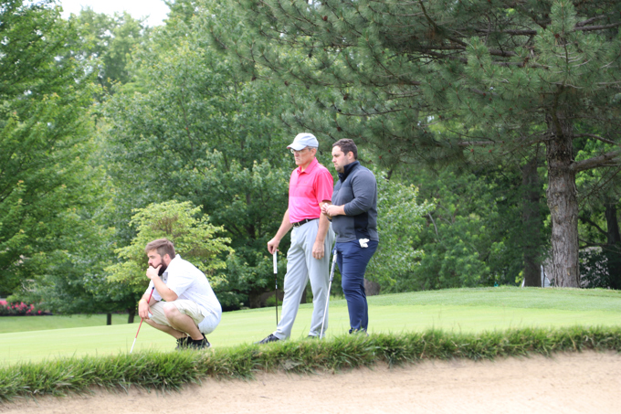 Golfers watching